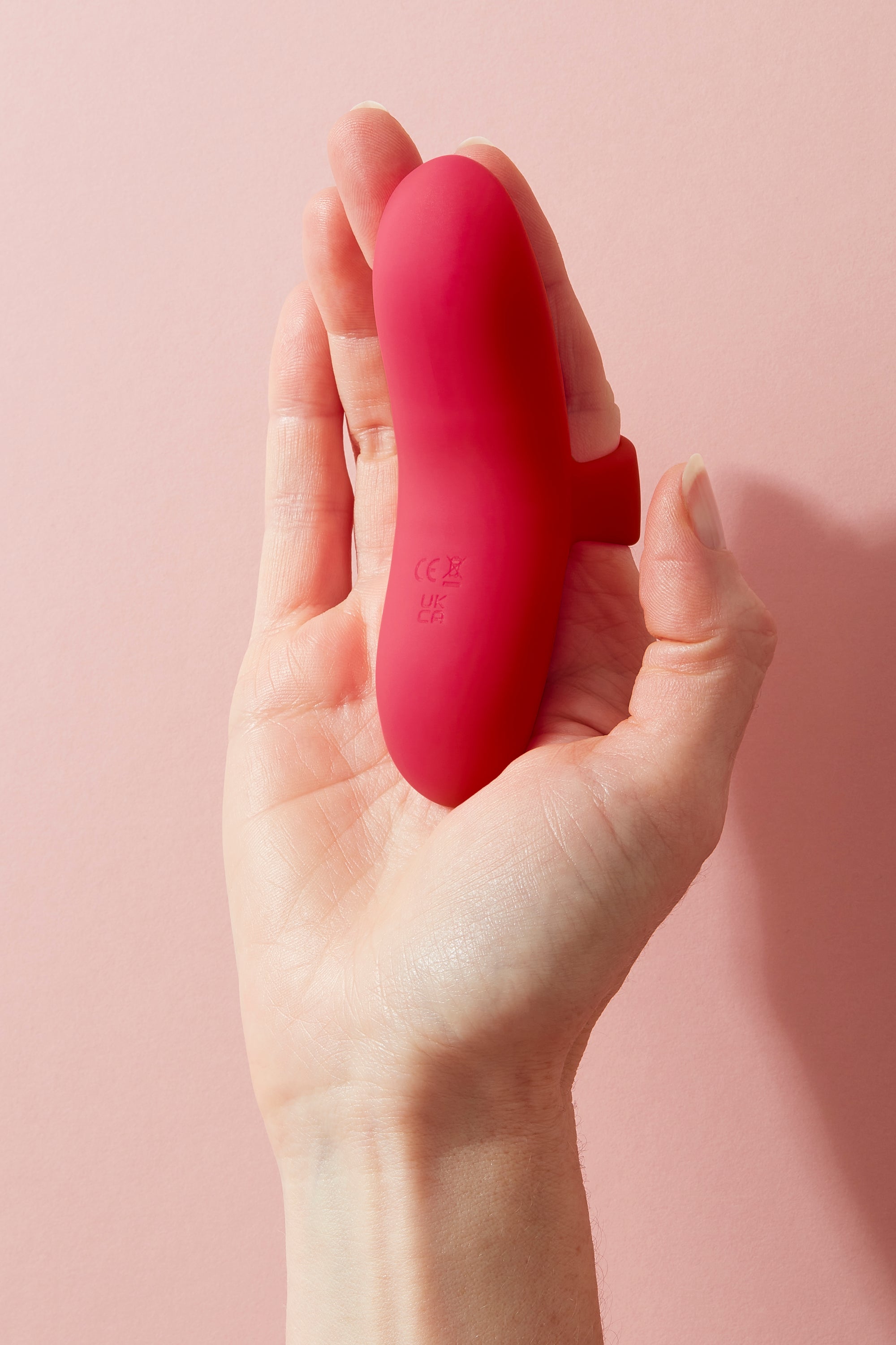 Bette finger vibrator held up towards camera