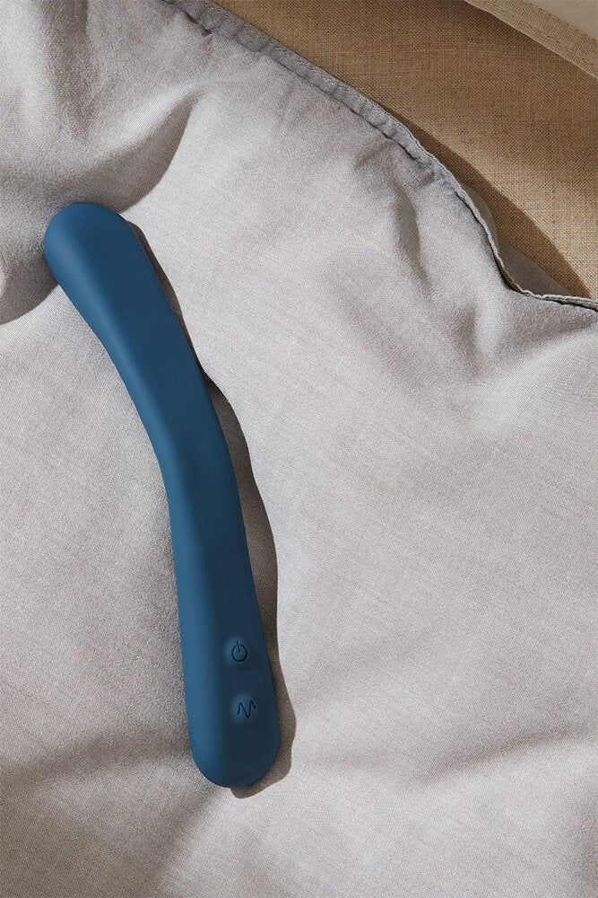 Lennon gspot vibrator laying on bed