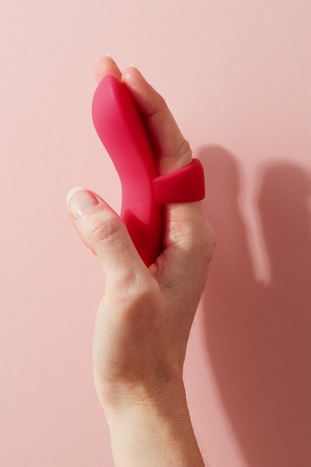 Bette finger vibrator on fingers held up