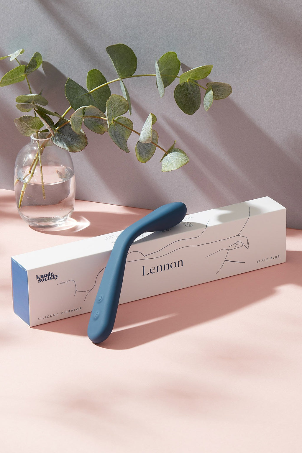Lennon gspot vibrator laying on its packaging