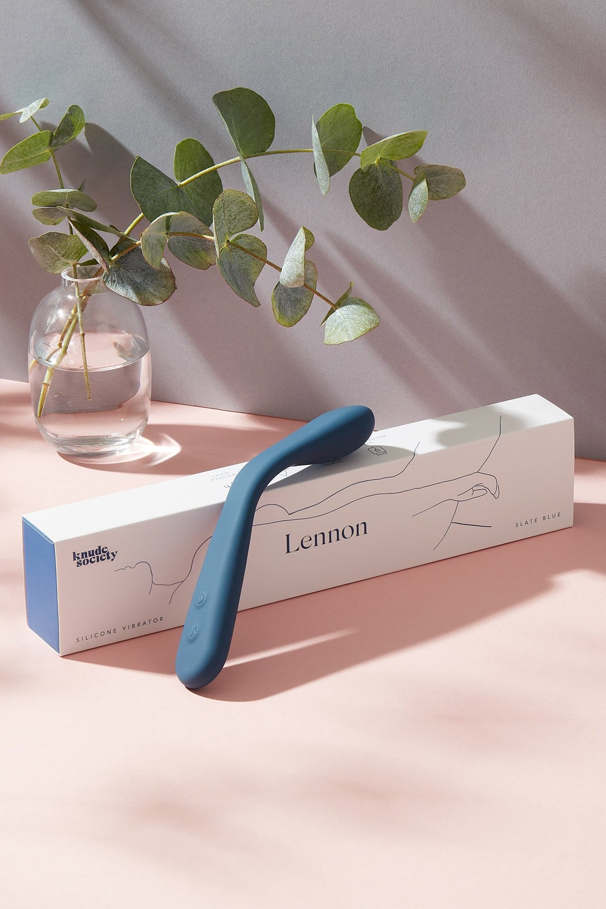 Lennon gspot vibrator laying on its packaging