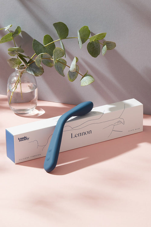 Lennon gspot vibrator laying on its packaging